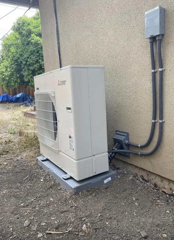 Mitsubishi Electric heat pump outdoor condenser installation