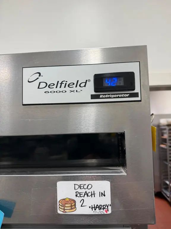 Delfield 6000 XL nameplate showing 42 degrees F before repair