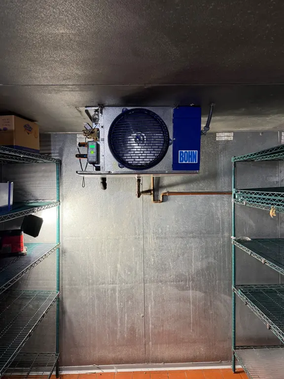 Bohn evaporator unit mounted inside walk-in cooler