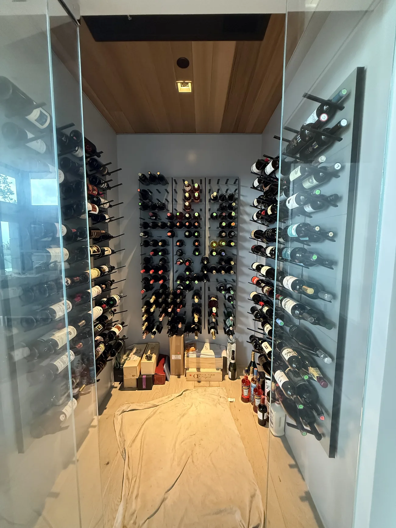Restored wine cellar with WhisperKOOL ceiling-mount unit holding setpoint after evaporator and TXV replacement