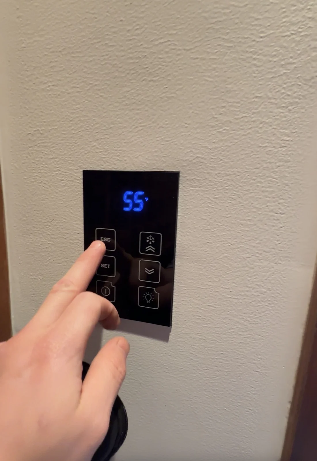 Wine cellar cooling system controller holding 55 degree setpoint after reinstallation completed