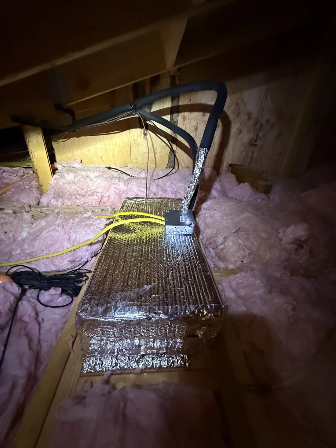 Wine cellar cooling evaporator finalized in attic with new line set connected, cabinet fully insulated and foil-taped, properly assembled